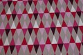 Bomuld med domino-mønster i rød, rosa, sand