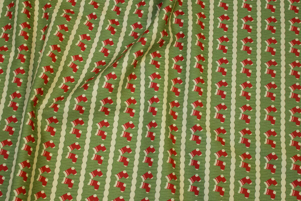 Lysegrøn julebomuld med røde sokker