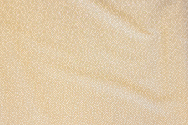 Lys sandfarvet bomuld med off white mikroprik