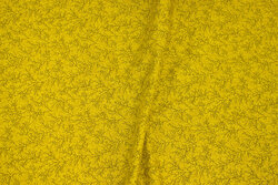 Messinggul patchwork-bomuld med lille grenmønster
