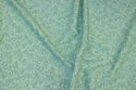 Mintgrøn patchwork-bomuld med lille grenmønster