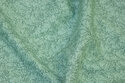 Mintgrøn patchwork-bomuld med lille grenmønster