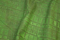 Patchwork-bomuld i støvede grønne nuancer