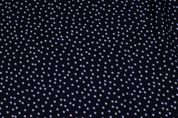 Polyester mousselin i sort med hvid prik