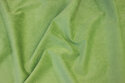 Smalriflet vårgrøn babyfløjl i polyester med let stræk