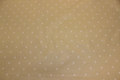 Lys sandfarvet textildug med 8 mm hvid prik