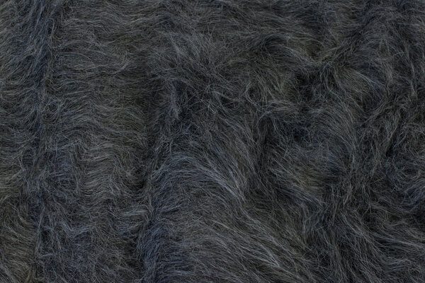 Langhåret pelsstof i mørk meleret grå
