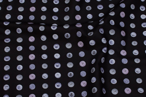 Sort patchwork-bomuld med grå knapper