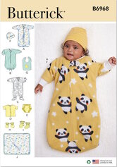 Baby bunting, jumpsuit, trøje, bledække, hue, hagesmæk, luffer, booties og blanket. Butterick 6968. 